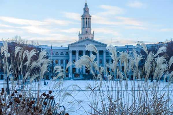A snowy photo of Colorado's State Capital Building, located in Denver, Colorado